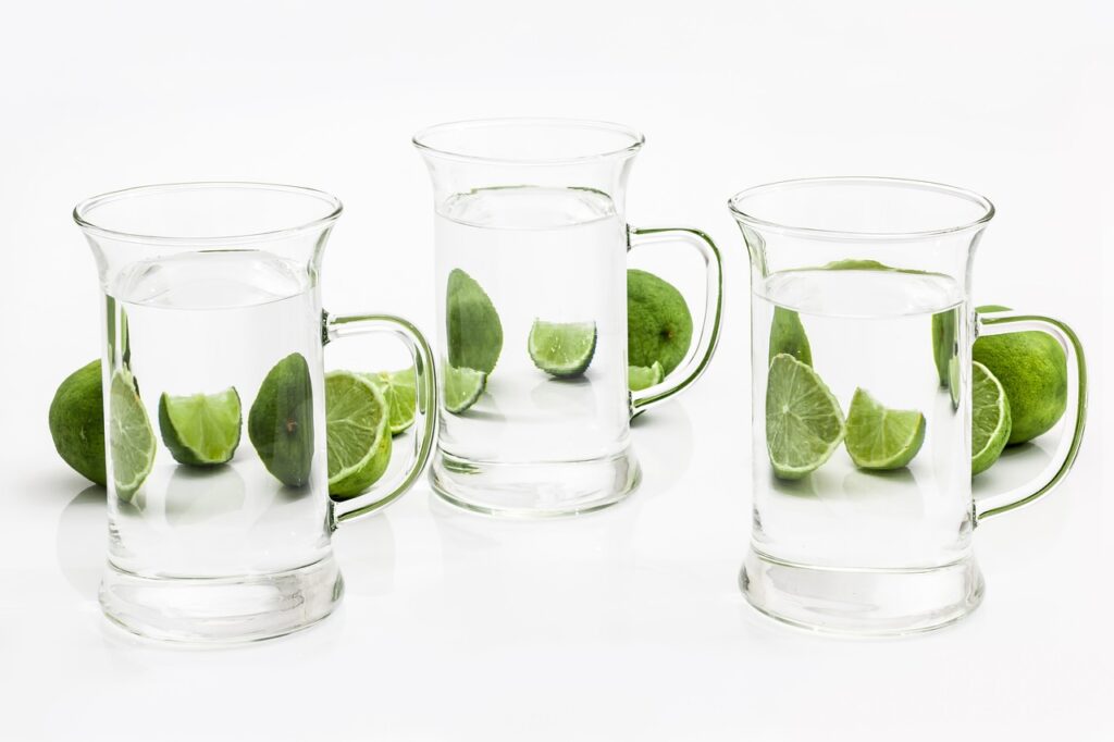 glass, drink, water, lime, citrus, liquid, distortion, diffraction, reflection, refraction, refreshment, glassware, cool, fruit, green, sour, clear, slice, fresh, nature, juice, vitamin